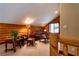 Loft-style living room featuring rustic log walls and cozy furnishings at 401 Alpine Way, Las Vegas, NV 89124