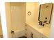 Bright bathroom featuring a shower and a vanity with a quartz countertop and modern black hardware at 404 Vassar Ln, Las Vegas, NV 89107
