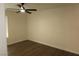 Neutral bedroom with new fan, light and vinyl floors at 404 Vassar Ln, Las Vegas, NV 89107