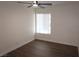 Bedroom features hardwood floors and ceiling fan at 404 Vassar Ln, Las Vegas, NV 89107