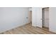 Bright bedroom with wood floors and closet at 4176 Demoline Cir, Las Vegas, NV 89141