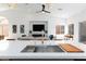 Open concept kitchen with large island, modern sink, and views of the living room, perfect for entertaining at 4176 Demoline Cir, Las Vegas, NV 89141