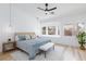 Serene main bedroom with soft lighting, window seat, and contemporary decor at 4176 Demoline Cir, Las Vegas, NV 89141