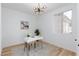 Home office with natural lighting, desk, and neutral decor at 4176 Demoline Cir, Las Vegas, NV 89141