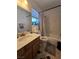 Bathroom features a single sink vanity with a shower and tub combo at 4612 Supreme Ct, Las Vegas, NV 89110