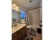 Bathroom featuring a single sink vanity, toilet, and shower-tub combo at 4612 Supreme Ct, Las Vegas, NV 89110