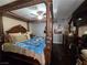 Main bedroom featuring hardwood floors and an ornate four-poster bed frame at 4612 Supreme Ct, Las Vegas, NV 89110