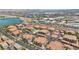 Wonderful aerial view of a neighborhood with a community pool, lush trees, and beautifully landscaped yards at 50 Aura De Blanco St # 2104, Henderson, NV 89074