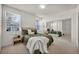 Bright bedroom with mirrored closet doors and natural light at 50 Aura De Blanco St # 2104, Henderson, NV 89074