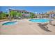 Enjoy the community pool and spa with ample lounge seating at 50 Aura De Blanco St # 2104, Henderson, NV 89074
