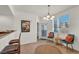 Bright dining area with decorative chandelier and large window at 50 Aura De Blanco St # 2104, Henderson, NV 89074