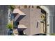 Bird's eye view of a home with a tile roof, showcases its layout, landscaping, and neighborhood at 5016 Wayfaring Tree Ave, Las Vegas, NV 89131