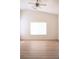 Bedroom with ceiling fan and large window that fills the room with light at 5112 Foggia Ave, Las Vegas, NV 89130