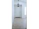 Entryway with neutral tile, front door, pendant lighting, and bright white walls at 5112 Foggia Ave, Las Vegas, NV 89130