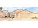 Charming single-story home featuring a two-car garage and a well-maintained xeriscaped front yard at 5112 Foggia Ave, Las Vegas, NV 89130