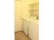 Clean Laundry Room with washer, dryer, and easy access to outside at 5112 Foggia Ave, Las Vegas, NV 89130