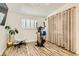 Bright bedroom features a ceiling fan, natural light, and vinyl plank flooring at 5217 Champions Ave, Las Vegas, NV 89142