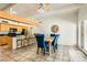 Open floorplan dining room area features a ceiling fan and modern decor at 5217 Champions Ave, Las Vegas, NV 89142