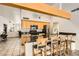 Well-equipped kitchen with stainless steel appliances and an eat-in breakfast bar at 5217 Champions Ave, Las Vegas, NV 89142