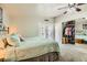 Spacious main bedroom featuring carpet flooring, double doors to the backyard, and a large closet at 5217 Champions Ave, Las Vegas, NV 89142