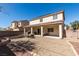 Expansive backyard showcasing desert landscaping and covered patio, perfect for outdoor relaxation at 6052 Puesta Del Sol St, North Las Vegas, NV 89081