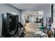 Bonus room showcasing workout equipment and comfortable access to an inviting living area at 6052 Puesta Del Sol St, North Las Vegas, NV 89081