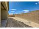 New backyard with block wall at 6607 Summershade St, North Las Vegas, NV 89086