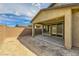Exterior view of the home's patio, backyard, and block wall at 6607 Summershade St, North Las Vegas, NV 89086