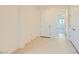 Bright entryway with tile flooring and a view into an adjacent room at 6607 Summershade St, North Las Vegas, NV 89086