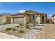 Beautiful single-Gathering home showcasing desert landscaping at 6607 Summershade St, North Las Vegas, NV 89086
