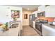 Contemporary kitchen features stainless steel appliances and sleek countertops at 7375 Hayes Harbor Ct # Lot 210, North Las Vegas, NV 89084