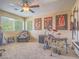 Versatile bonus room with a ceiling fan and plenty of natural light, ideal for recreation or hobbies at 8106 Eagle Clan Ct, Las Vegas, NV 89131