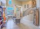 Grand foyer with high ceilings, a curved staircase, and tile floors sets a tone of elegance at 8106 Eagle Clan Ct, Las Vegas, NV 89131
