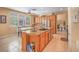 Eat-in kitchen features a center island, stainless steel appliances, and a breakfast nook at 8106 Eagle Clan Ct, Las Vegas, NV 89131