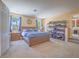 Spacious main bedroom with ample natural light, carpet, and storage, creating a serene and inviting retreat at 8106 Eagle Clan Ct, Las Vegas, NV 89131