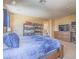 Comfortable main bedroom featuring soft bedding, carpet, and storage solutions, providing a relaxing atmosphere at 8106 Eagle Clan Ct, Las Vegas, NV 89131