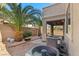 Backyard featuring desert landscaping, and a covered patio, ready for outdoor enjoyment at 8220 Chimney Bluffs St, North Las Vegas, NV 89085