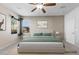 Serene primary bedroom with soft colors, a cozy bed, and lots of natural light at 8220 Chimney Bluffs St, North Las Vegas, NV 89085