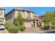 Charming two-story home featuring a two-car garage and manicured landscaping at 8220 Chimney Bluffs St, North Las Vegas, NV 89085