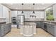 Spacious kitchen with stainless steel appliances and granite countertops at 8220 Chimney Bluffs St, North Las Vegas, NV 89085