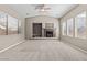 Bright living room boasting cozy fireplace, recessed lights, and ample windows at 8220 Chimney Bluffs St, North Las Vegas, NV 89085