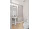 Compact powder room featuring a pedestal sink and neutral wall color at 8220 Chimney Bluffs St, North Las Vegas, NV 89085