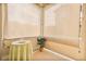 A cozy exterior balcony with a small table and potted plant at 8985 S Durango Dr # 1177, Las Vegas, NV 89113
