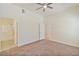 Neutral bedroom with ceiling fan and ensuite bathroom at 8985 S Durango Dr # 1177, Las Vegas, NV 89113
