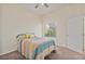 Cozy bedroom features large window, ceiling fan and a warm, inviting atmosphere at 8985 S Durango Dr # 1177, Las Vegas, NV 89113