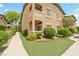 Beautiful exterior of a two-story condo featuring well-maintained landscaping at 8985 S Durango Dr # 1177, Las Vegas, NV 89113