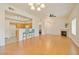 Open living space featuring hardwood floors, kitchen, and fireplace at 8985 S Durango Dr # 1177, Las Vegas, NV 89113