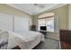Bedroom with neutral color, ceiling fan, and closet at 9220 Evergreen Canyon Dr, Las Vegas, NV 89134