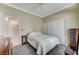 Bedroom with neutral color, ceiling fan and closet at 9220 Evergreen Canyon Dr, Las Vegas, NV 89134