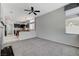 Spacious living room with a view of the kitchen and dining area at 9220 Evergreen Canyon Dr, Las Vegas, NV 89134
